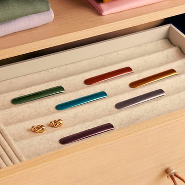 Ploom AURA front panels with Amazon Green and other color options.