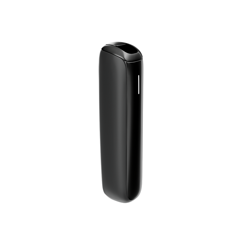 The sleek Ploom AURA Jet Black device is a discreet companion on the table
